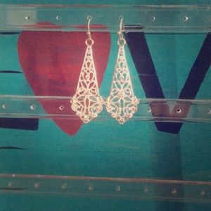 Silver earrings with flowers indented 3/$10 5/$5